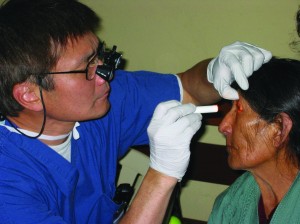 Dr. Wong examining cataract patient