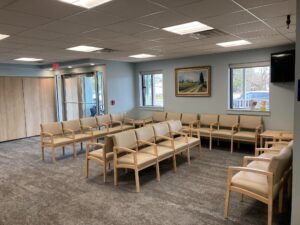 Large patient waiting room with rows of chairs at Princeton Eye Group’s new Somerset office
