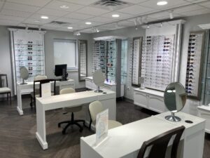 Optical Shoppe with eyeglass displays and consultation tables in Princeton Eye Group’s Somerset office